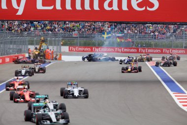Nico Hulkenberg Sahara Force India and Marcus Ericsson Sauber crash at the start of the race.