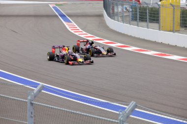 Daniel Ricciardo Red Bull Racing overtaking Carlos Sainz Toro Rosso