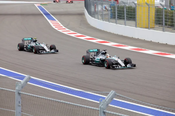 Lewis Hamilton of Mercedes AMG Petronas F1 Team leads Nico Rosberg Mercedes AMG Petronas Formula 1 Team
