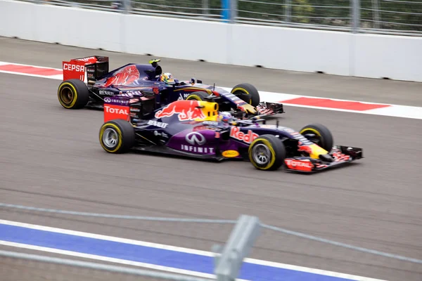 Daniel Ricciardo Red Bull Racing overtaking Carlos Sainz Toro Rosso