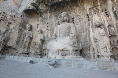 Luoyang The Buddha of Longmen Grottoes in China clipart