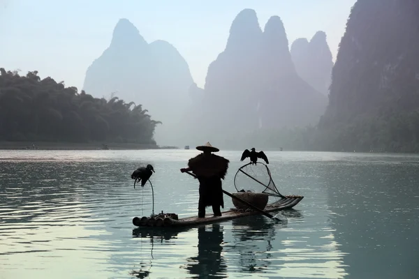 Chinese man fishing — Stock Photo, Image