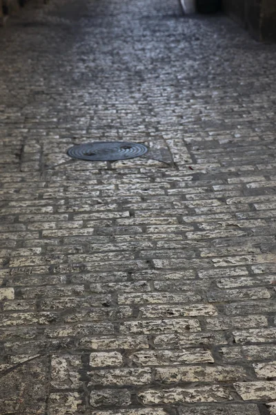 Old paving stone road — Stock Photo, Image