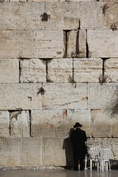 Jewish man praying at the Wailing Wall Stock Photo