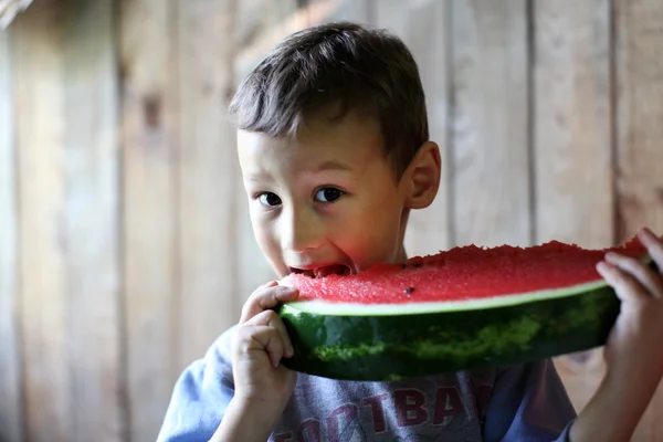 Caucasian boy with water-melon — Stock Photo, Image