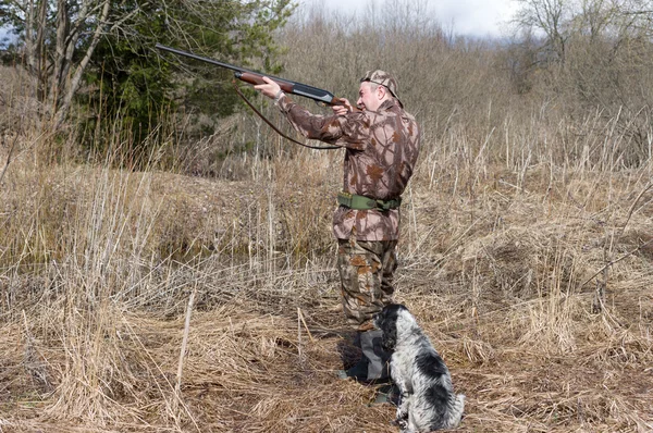 Hunter with a dog — Stock Photo, Image