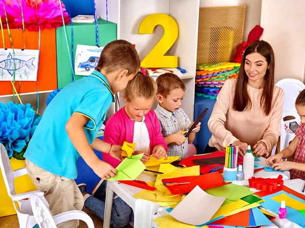 Group kids holding origami airplane in kindergarten . — Stock Photo, Image