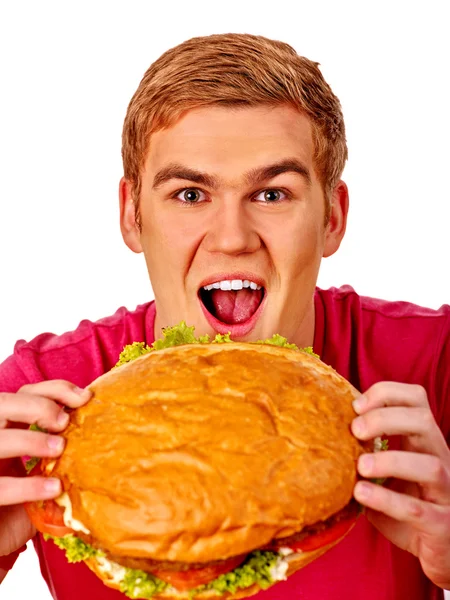 Homem comendo sanduíche grande . — Fotografia de Stock