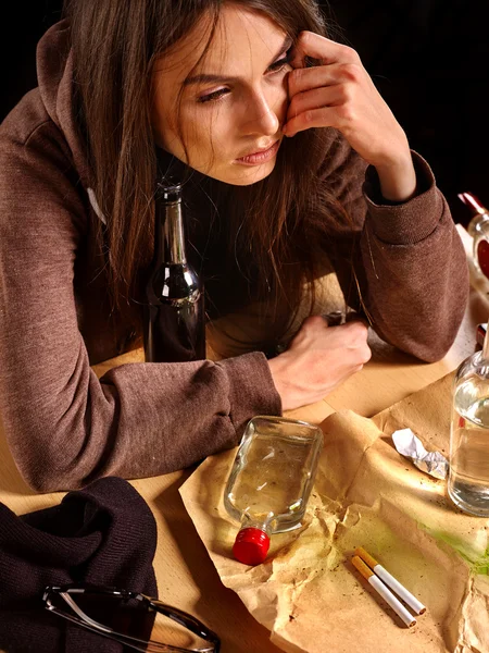 Drunk girl holding bottle of vodka. — Stock Photo, Image