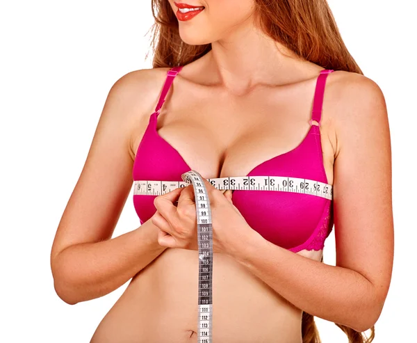 The girl in underwear measuring breast size centimeter. — Stock Photo, Image