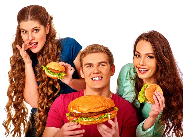 Gruppo di persone che tengono grandi gustosi hamburger . — Foto Stock