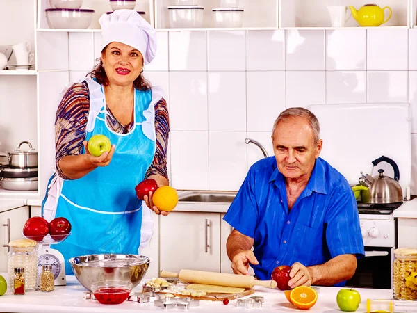 Senior family  baking cookies at kitchen. — Stok fotoğraf