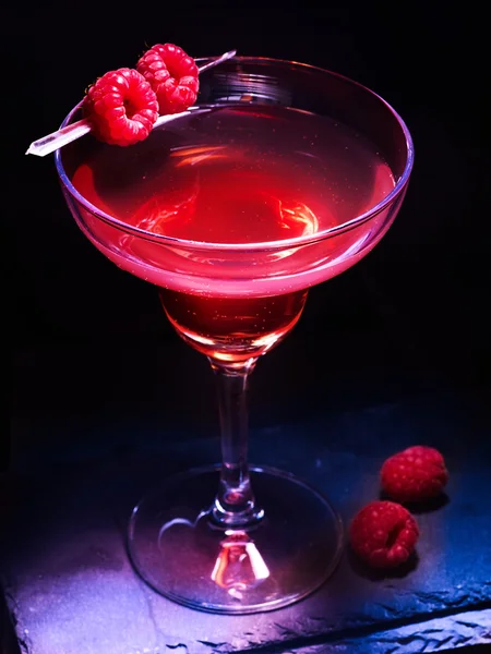 Raspberry martini cocktail on black background . — Stock Photo, Image