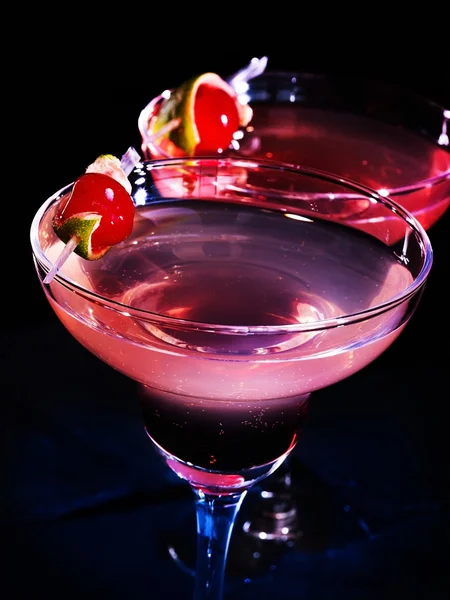 Pomegranate cocktail glasses with cherry . — Stock Photo, Image