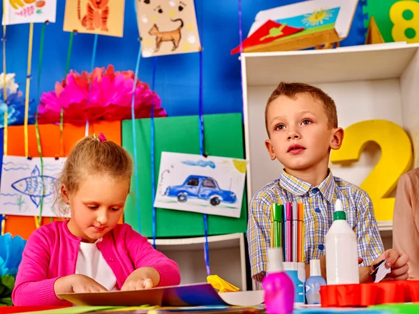 Group kids mold from plasticine in kindergarten . — Stock Photo, Image