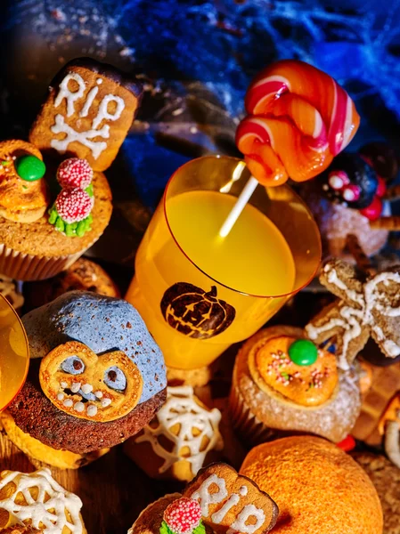 Halloween table with trick or treat Jack OLanten pumpkin. — Stock Photo, Image