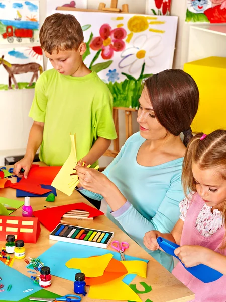 Children with teacher at classroom. — Stock Photo, Image