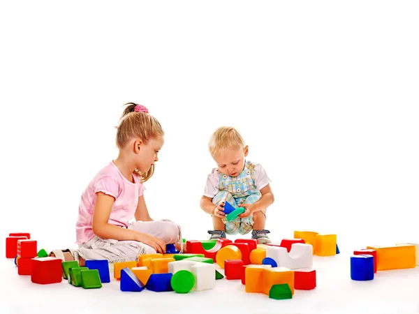 Children play with blocks. Stock Picture