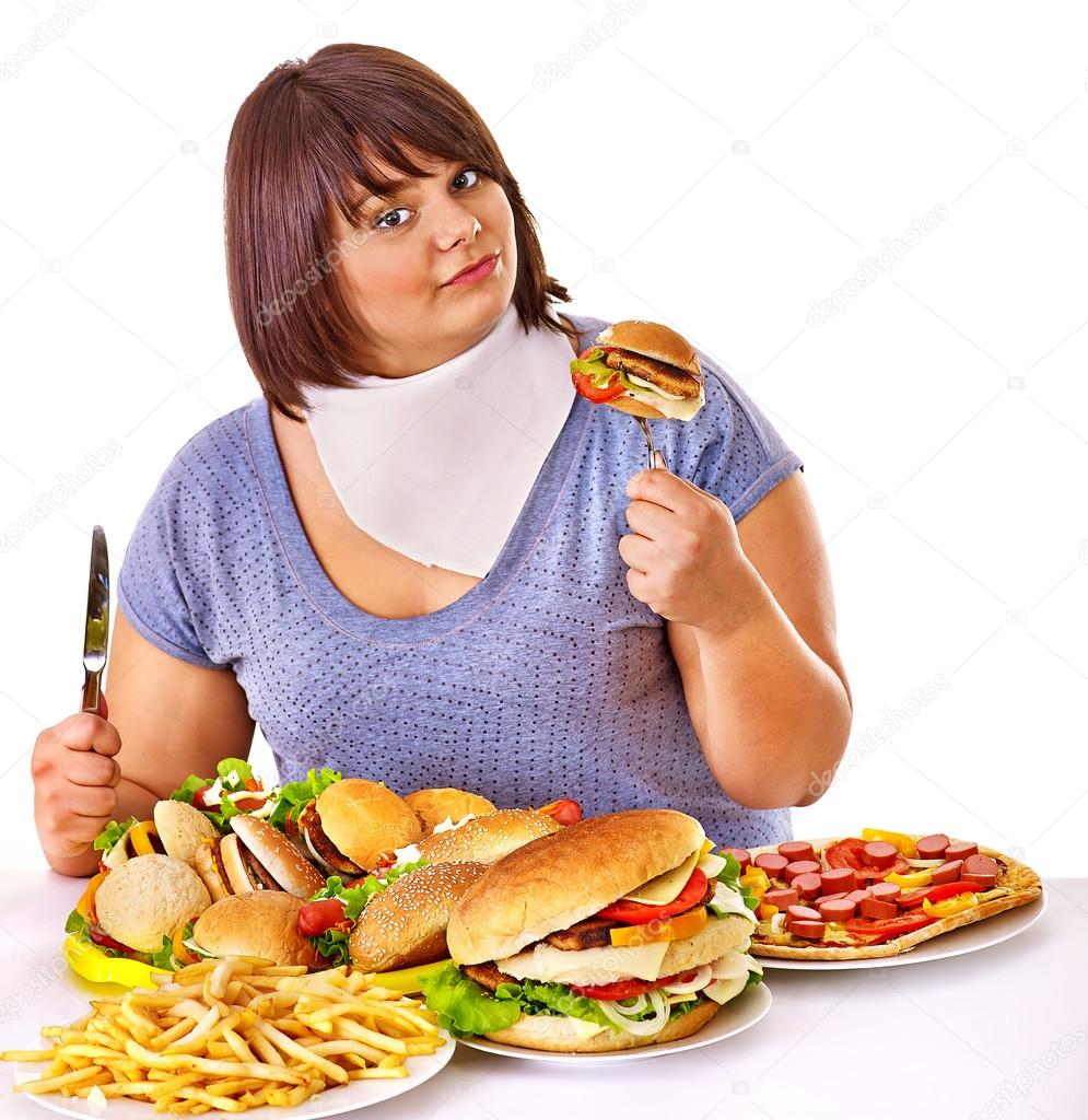 Woman eating fast food.
