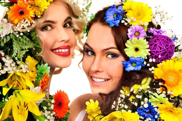 Women with make up and flowers. Stock Image