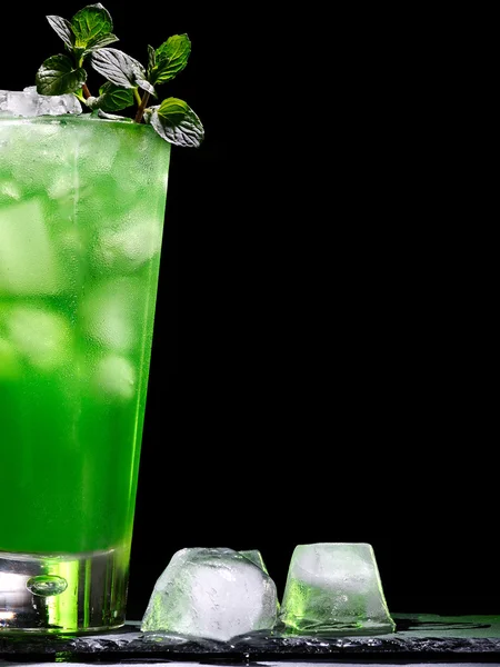 Green drink on dark — Stock Photo, Image