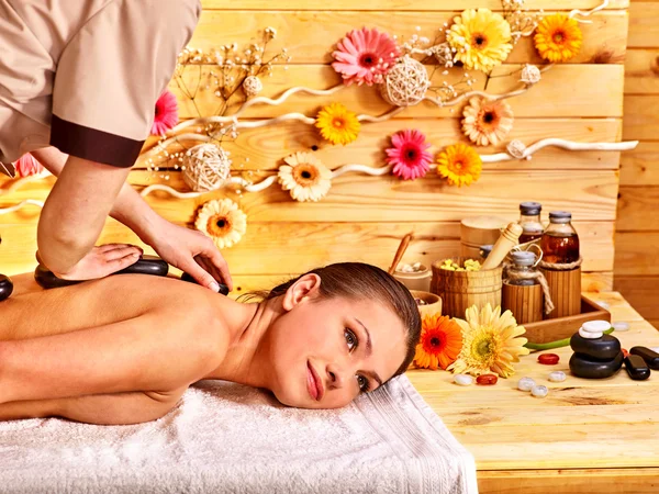 Woman getting stone therapy massage . — Stock Photo, Image