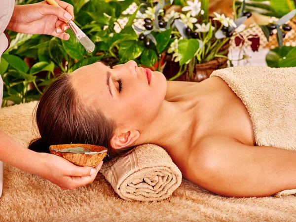 Girl having facial mask — Stock Photo, Image