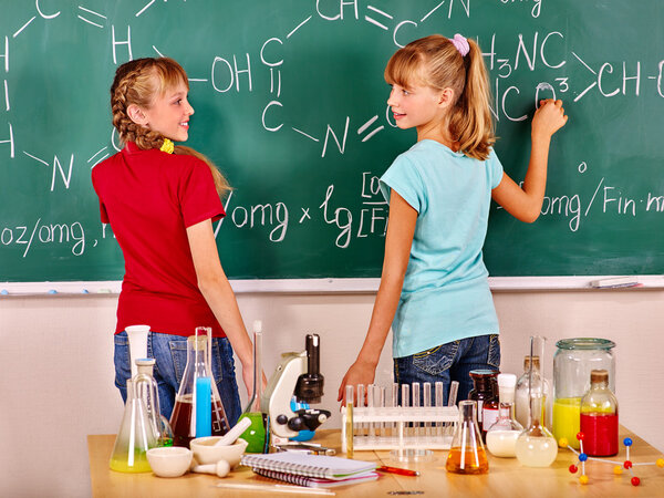 Children in chemistry class.