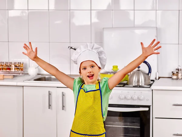 Child cooking at kitchen. — Stock Photo, Image