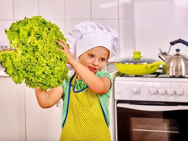 Child cooking at kitchen. — Stock Photo, Image