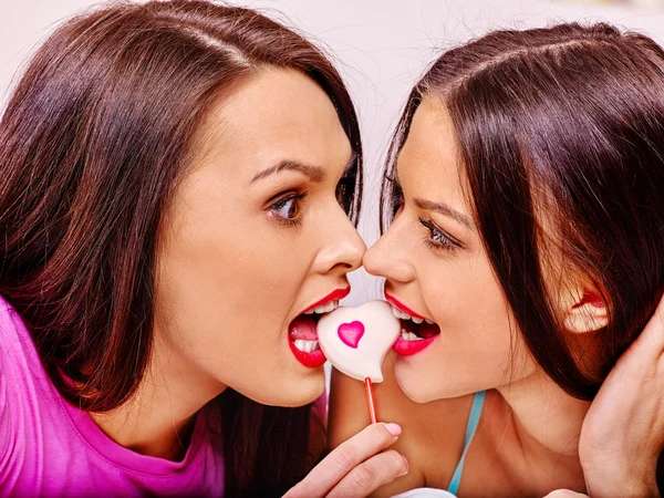 Lesbian women kissing in erotic game — Stock Photo, Image