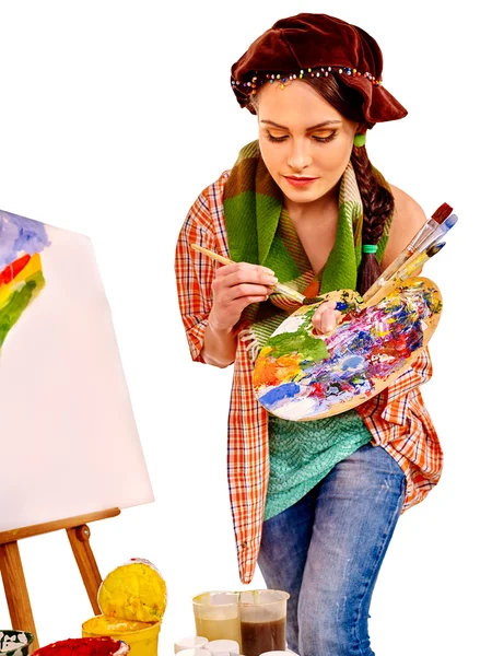 Young artist at work near easel. — Stock Photo, Image