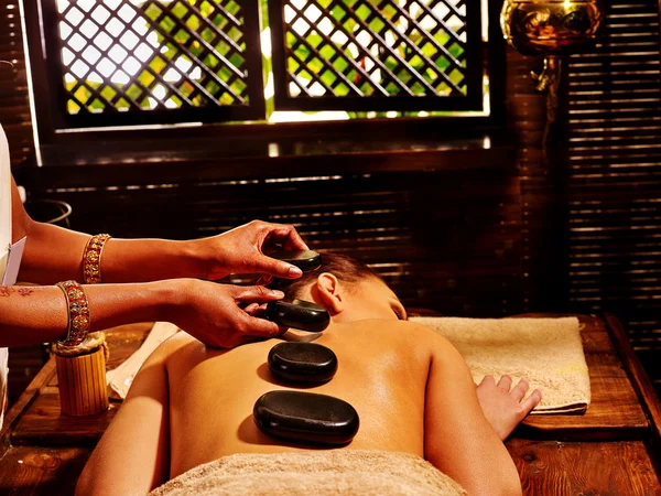 Woman having Ayurvedic stone massage. — Stock Photo, Image