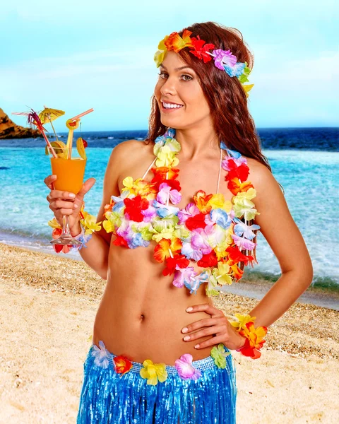 Woman in hawaii costume drink  juice. — Stock Photo, Image