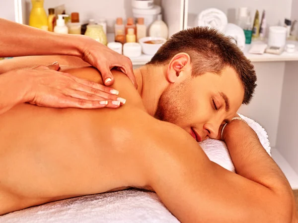 Man getting massage in spa. — Stock Photo, Image