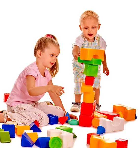 Children play building blocks. Stock Image