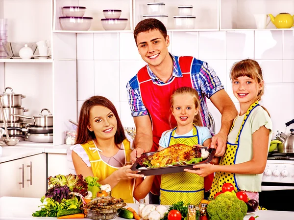 Happy family with grandmother at kitchen. — Stock Photo, Image
