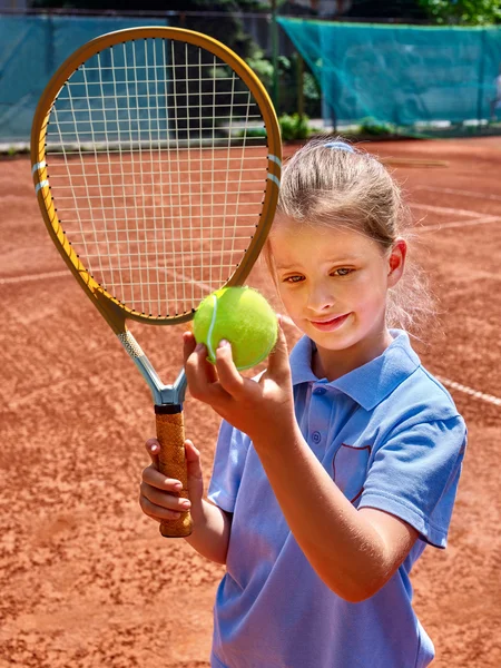 Sister girl athlete  with racket and ball — Stock Photo, Image