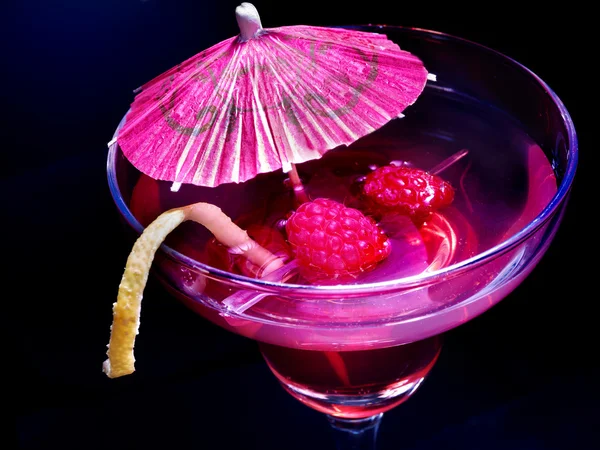 Pomegranate drink with raspberries — Stock Photo, Image