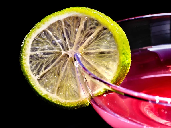 Pomegranate drink with lime — Stock Photo, Image