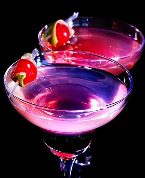 Pomegranate cocktails with cherries — Stock Photo, Image