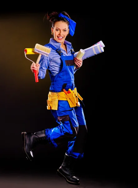 Builder woman with wallpaper. — Stock Photo, Image