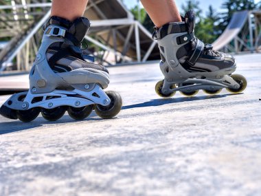 riding roller skates clipart