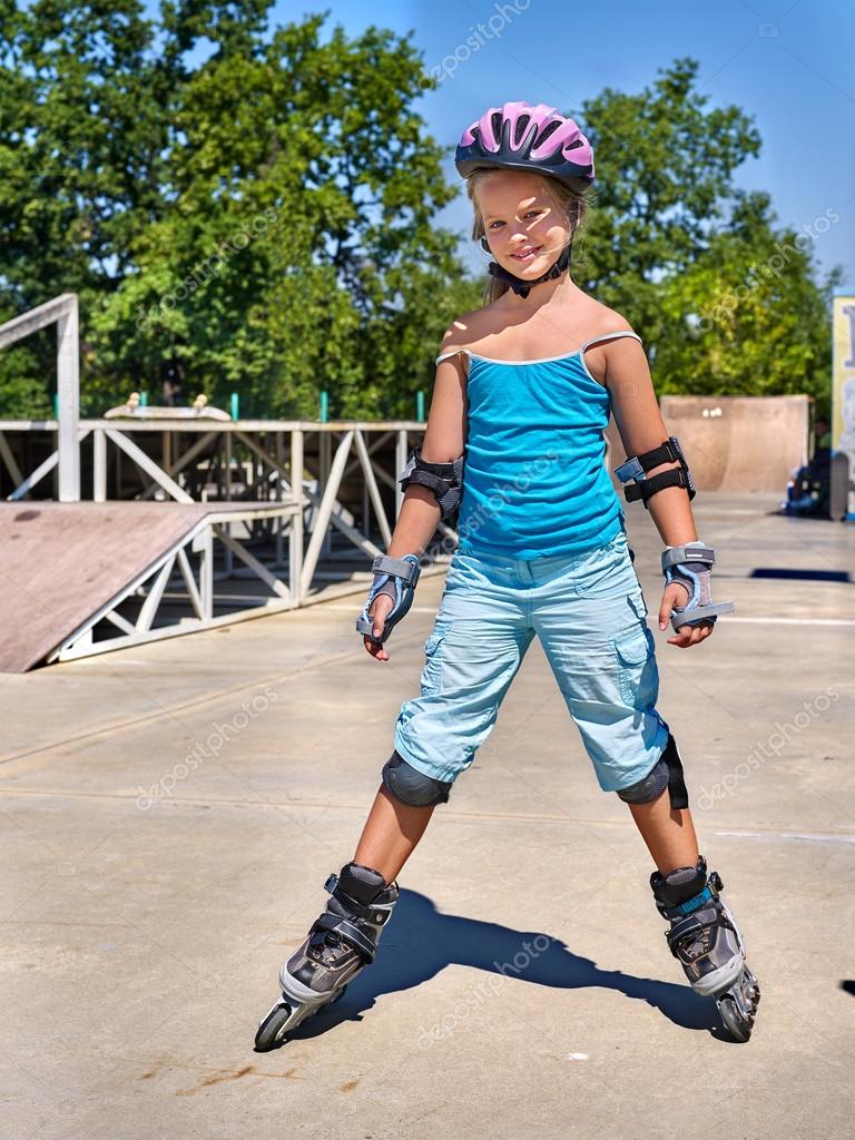 Girl riding on roller skates — Stock Photo © poznyakov 82930090