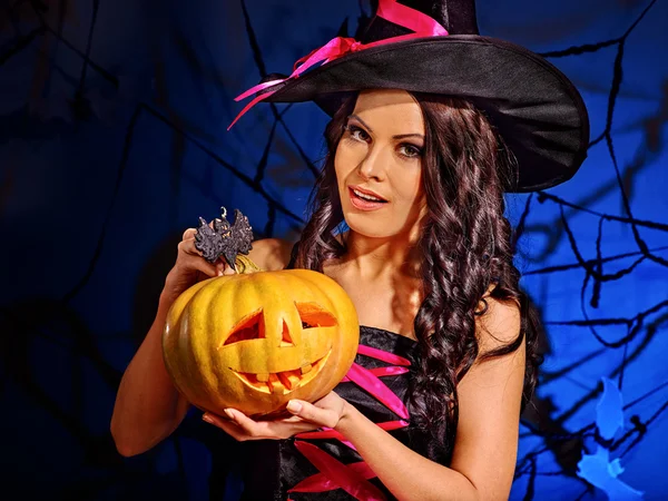 Witch holding pumpkin — Stock Photo, Image