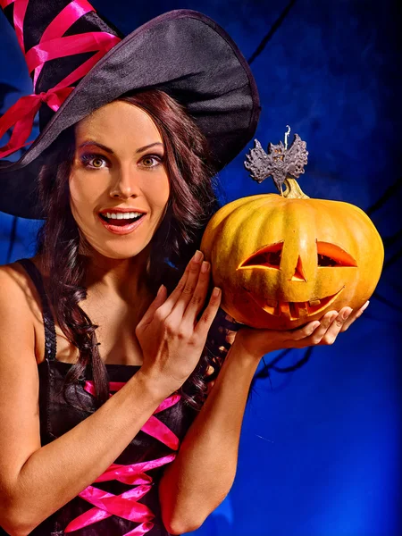 Witch holding pumpkin — Stock Photo, Image