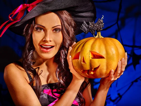 Witch holding pumpkin — Stock Photo, Image