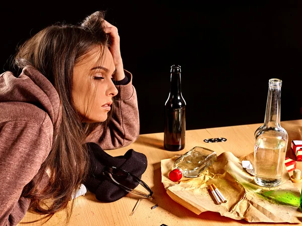 Girl with closed eyes in depression drinking alcohol. — Stock Photo, Image