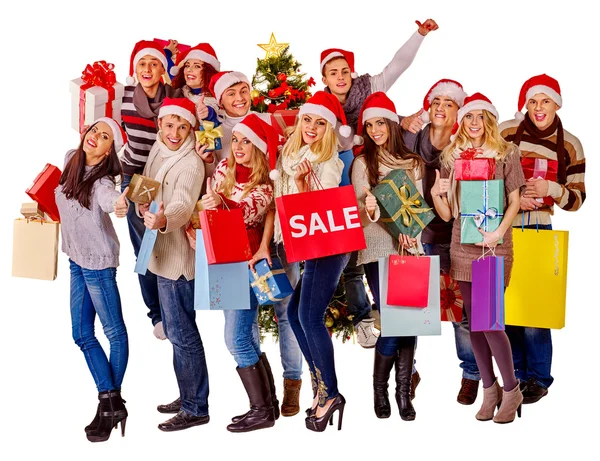 Flicka i santa hatt hålla jul presentförpackning. — Stockfoto
