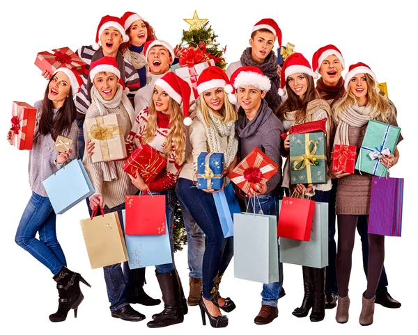 Mädchen mit Weihnachtsmütze in Weihnachtsgeschenkschachtel. — Stockfoto